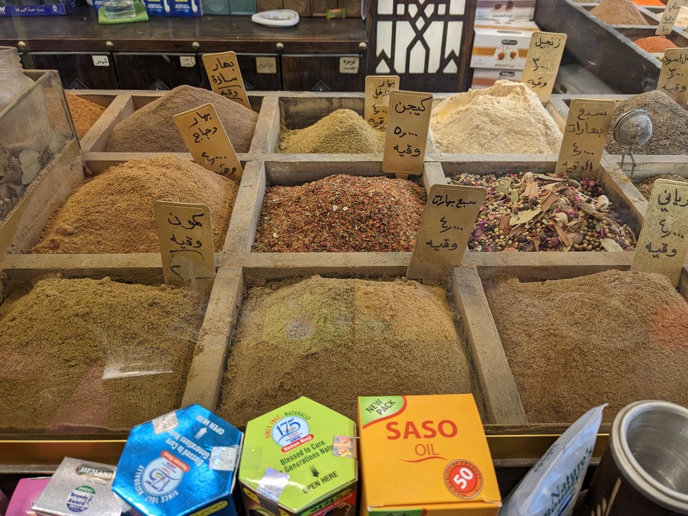 a window display of several spice blends offered for sale
