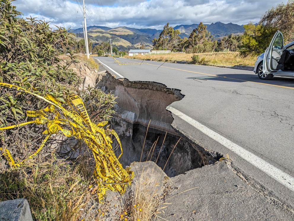 the left lane of a paved road has been undercut by water and a section 30 feet long has fallen away