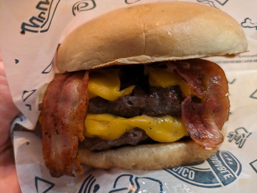 a double cheeseburger with bacon
