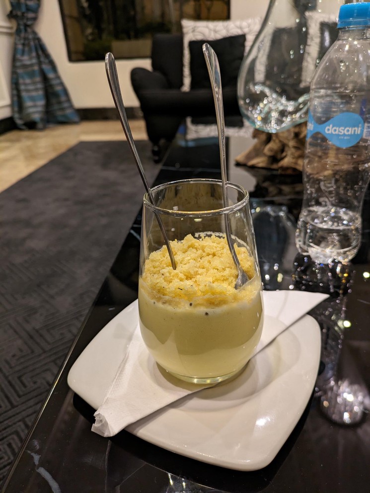 Passion Fruit Mousse in a glass with two spoons